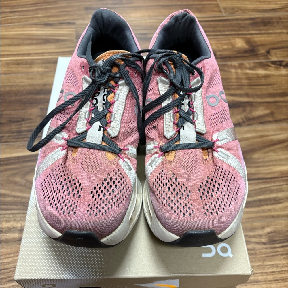 On Cloudeclipse women’s running shoes in the Tangerine/Ivory colorway, size 7.5W